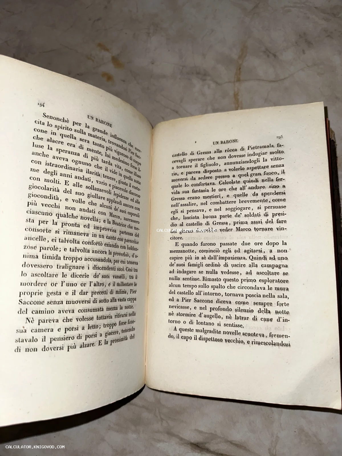 Разворот старинной книги на итальянском языке с текстом главы Un Barone на пожелтевших страницах.