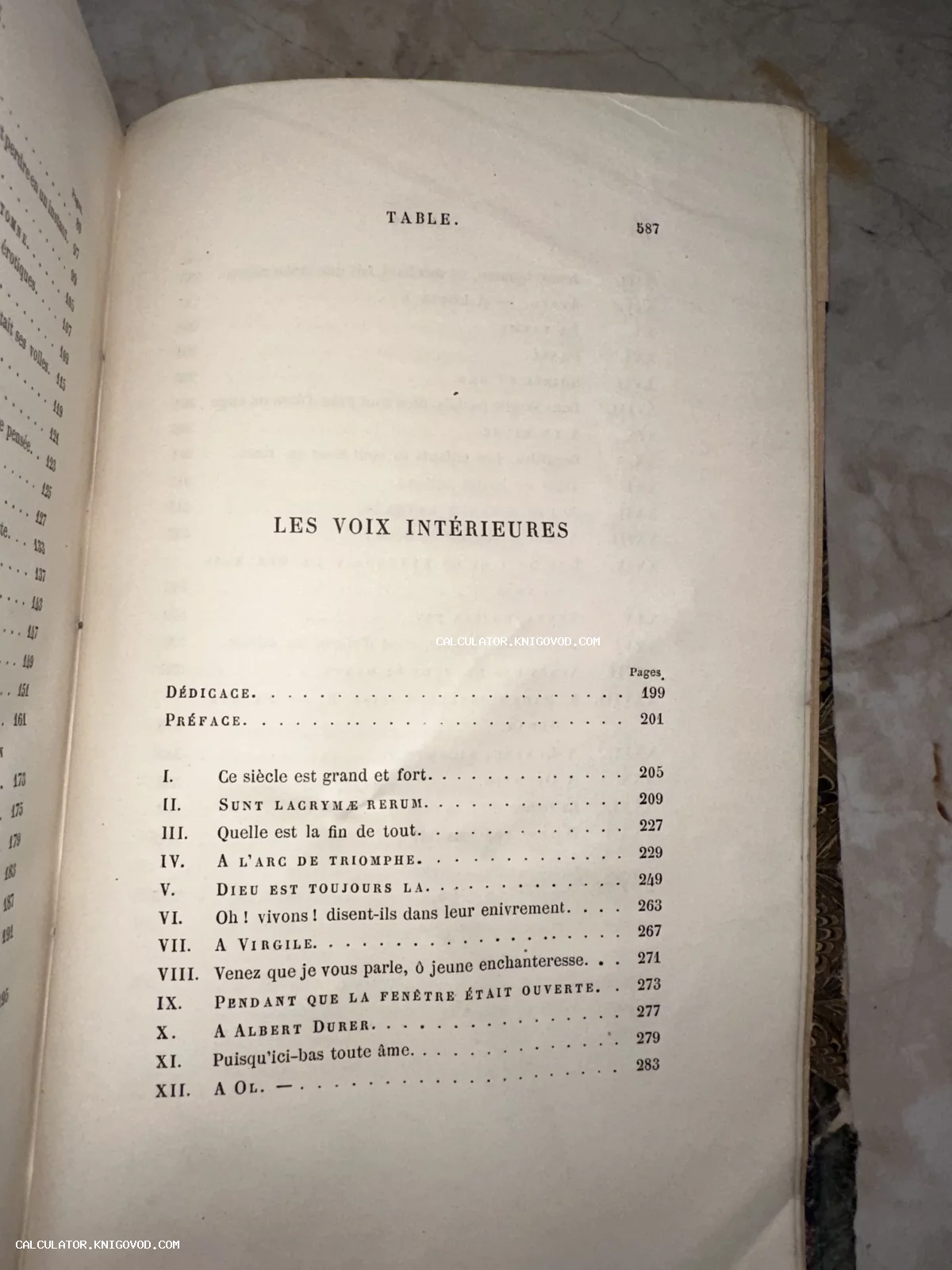 Страница оглавления старинной французской книги с заголовком Les Voix Interieures и списком глав на пожелтевшей бумаге.