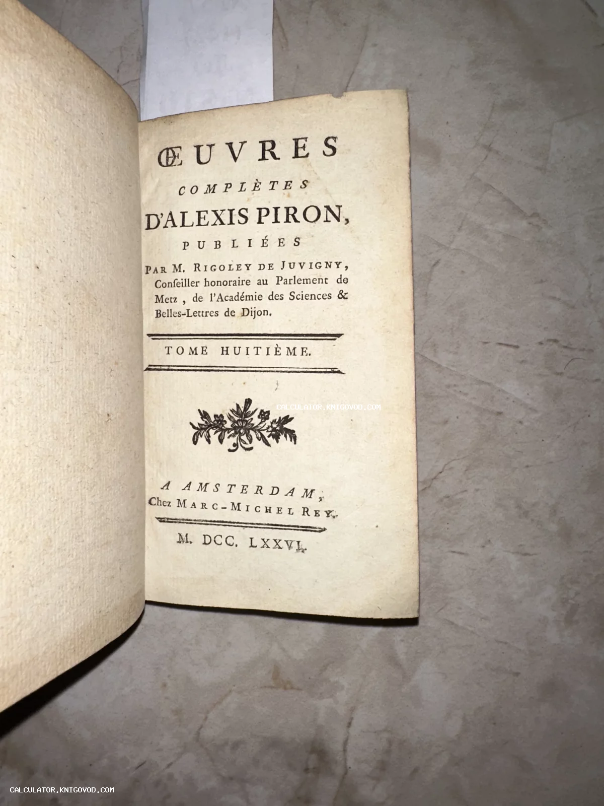 Титульный лист антикварной книги 'Oeuvres Complètes d'Alexis Piron', изданной в Амстердаме в 1776 году.
