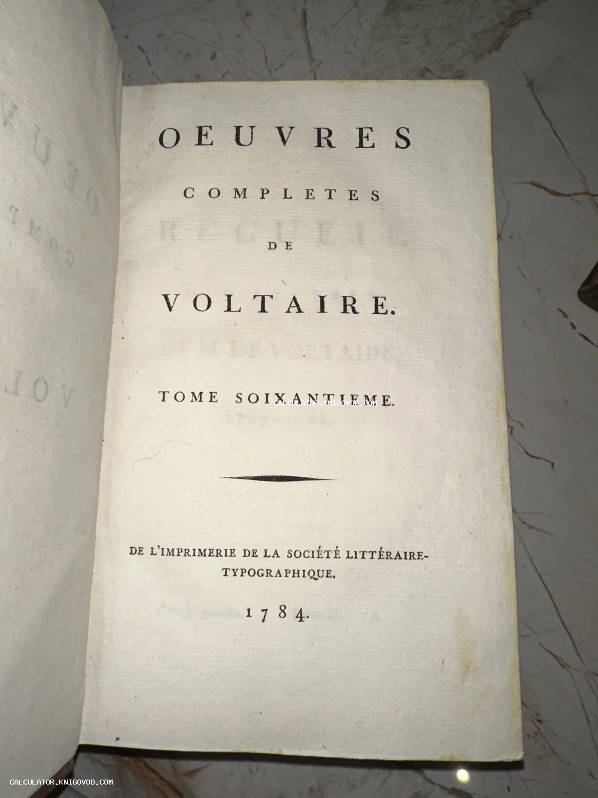 Титульный лист антикварного французского издания Вольтера 1784 года выпуска.