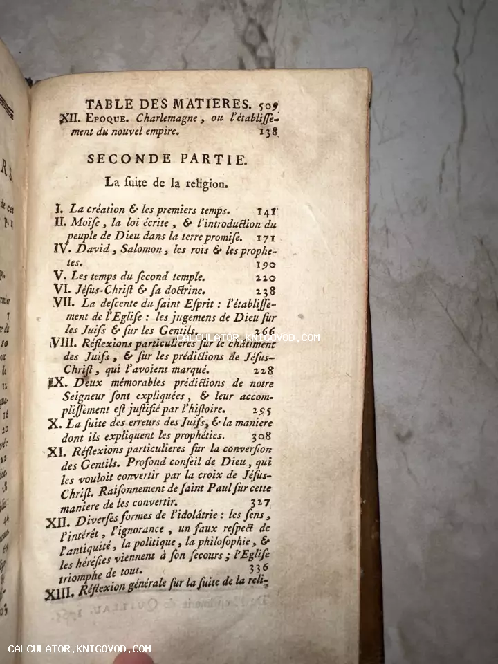 Страница антикварной книги на французском языке с заголовком Table des Matieres и списком глав, посвященных религии.