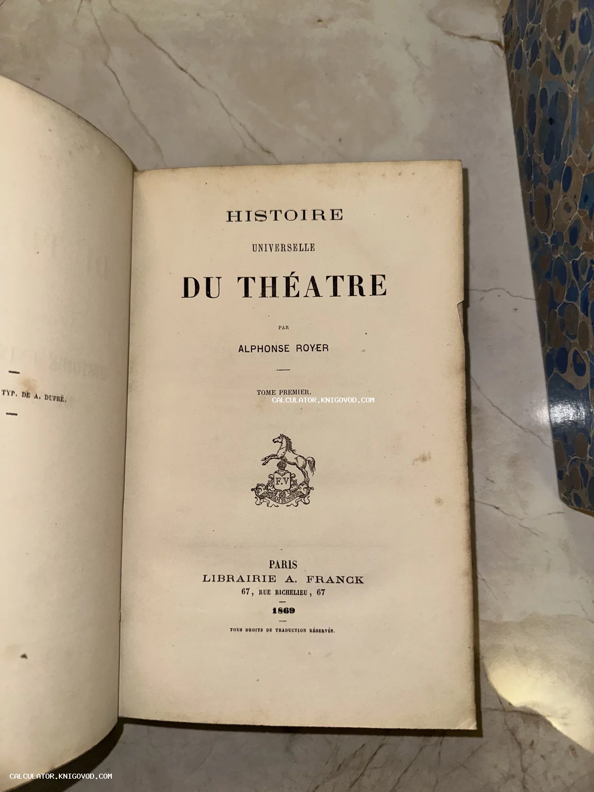 Титульный лист старинной французской книги 1869 года Histoire Universelle du Théâtre автора Alphonse Royer.