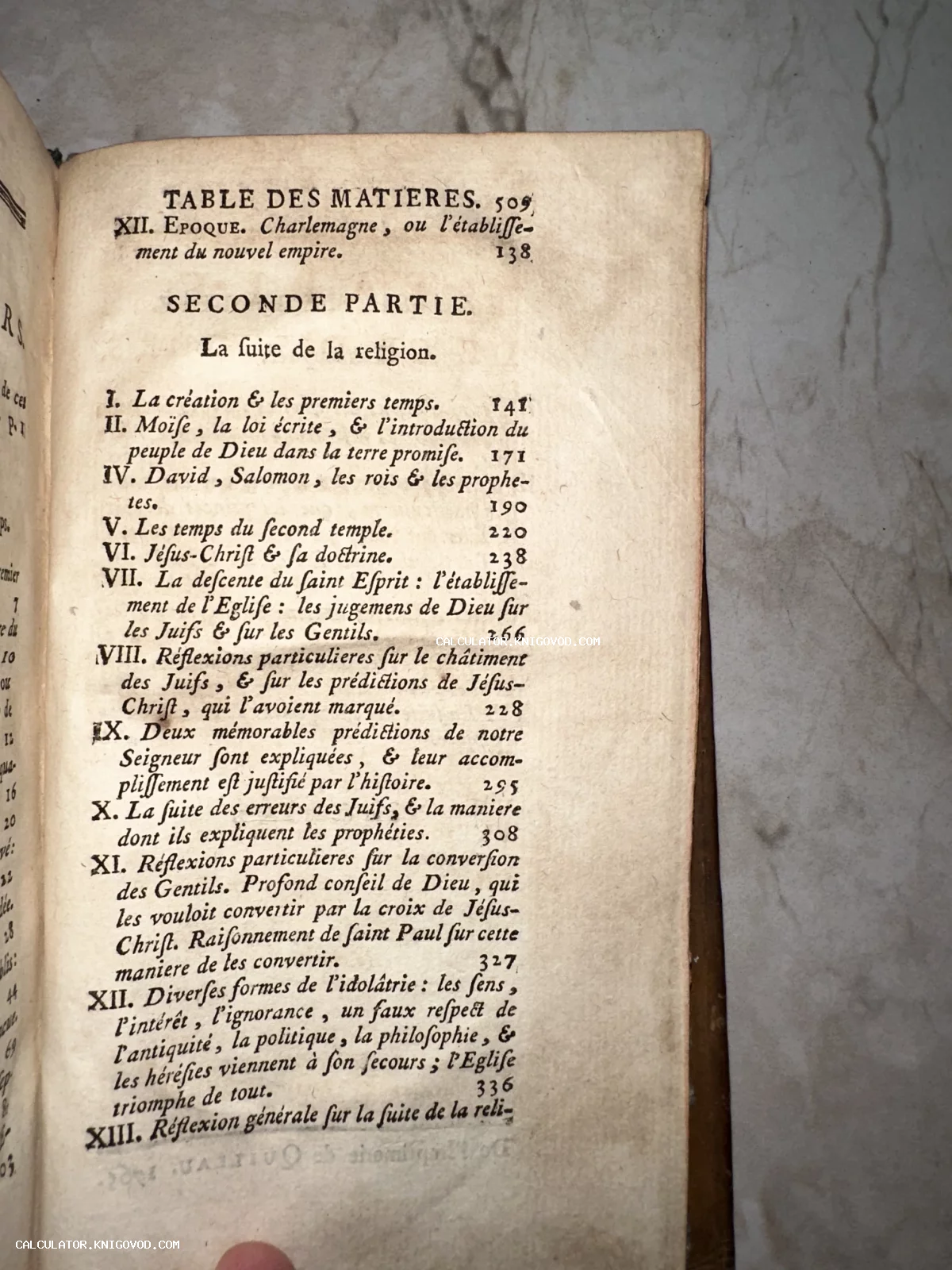 Страница антикварной книги на французском языке с заголовком Table des Matieres и списком глав, посвященных религии.