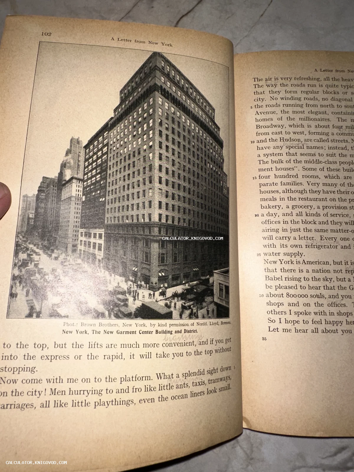 Разворот старинной книги с черно-белой фотографией небоскреба Garment Center Building в Нью-Йорке и английским текстом.