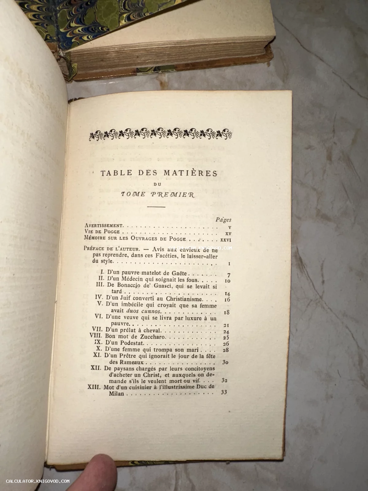 Разворот старинной книги на французском языке с заголовком Table des Matières и списком глав.