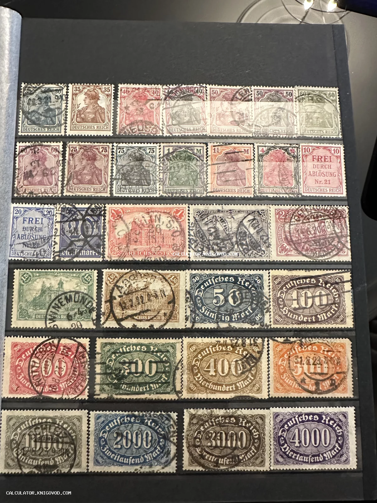 Страница филателистического альбома с антикварными марками Германии начала XX века, включая серию «Германия» и выпуски периода гиперинфляции.