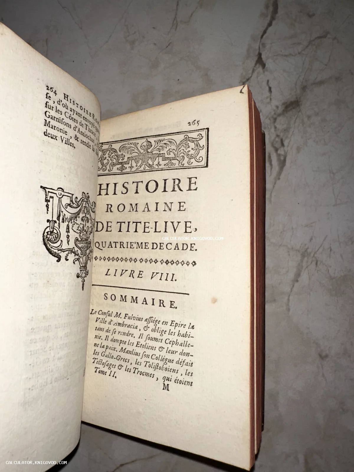 Разворот старинной книги на французском языке с заголовком Histoire Romaine de Tite-Live и декоративными типографскими виньетками.